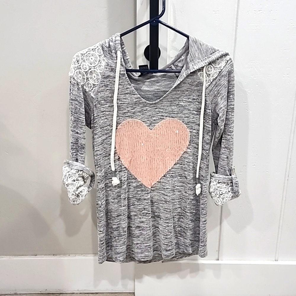 Mid length sleeves with hood.